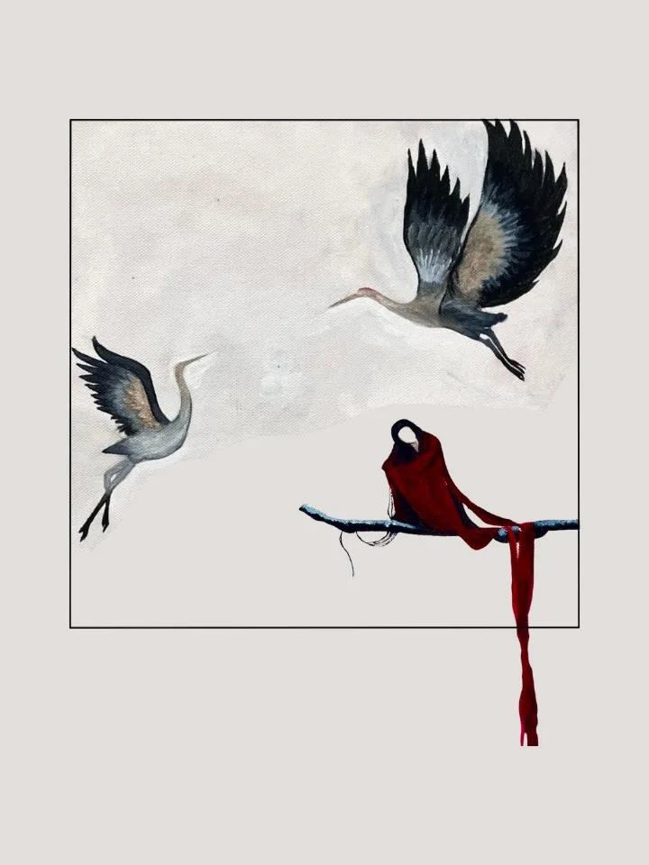 Two cranes in flight above a branch draped with red cloth